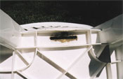 Mold growing on the underside of a plastic lawn chair 